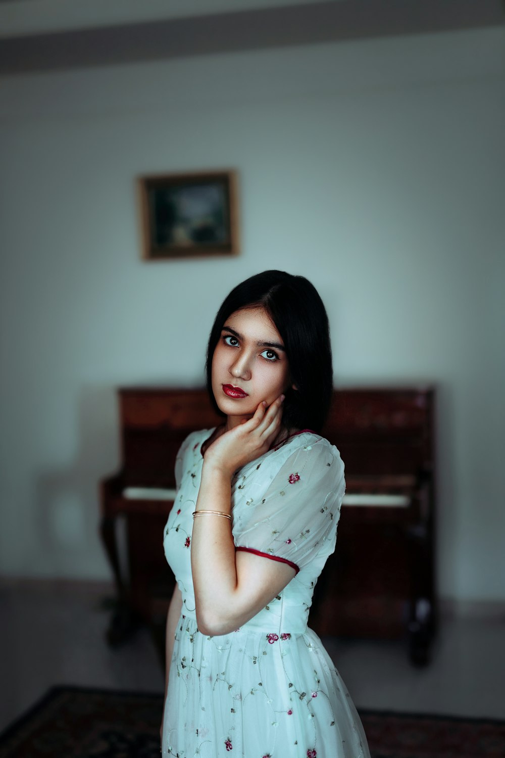 shallow focus photo of woman in white dress