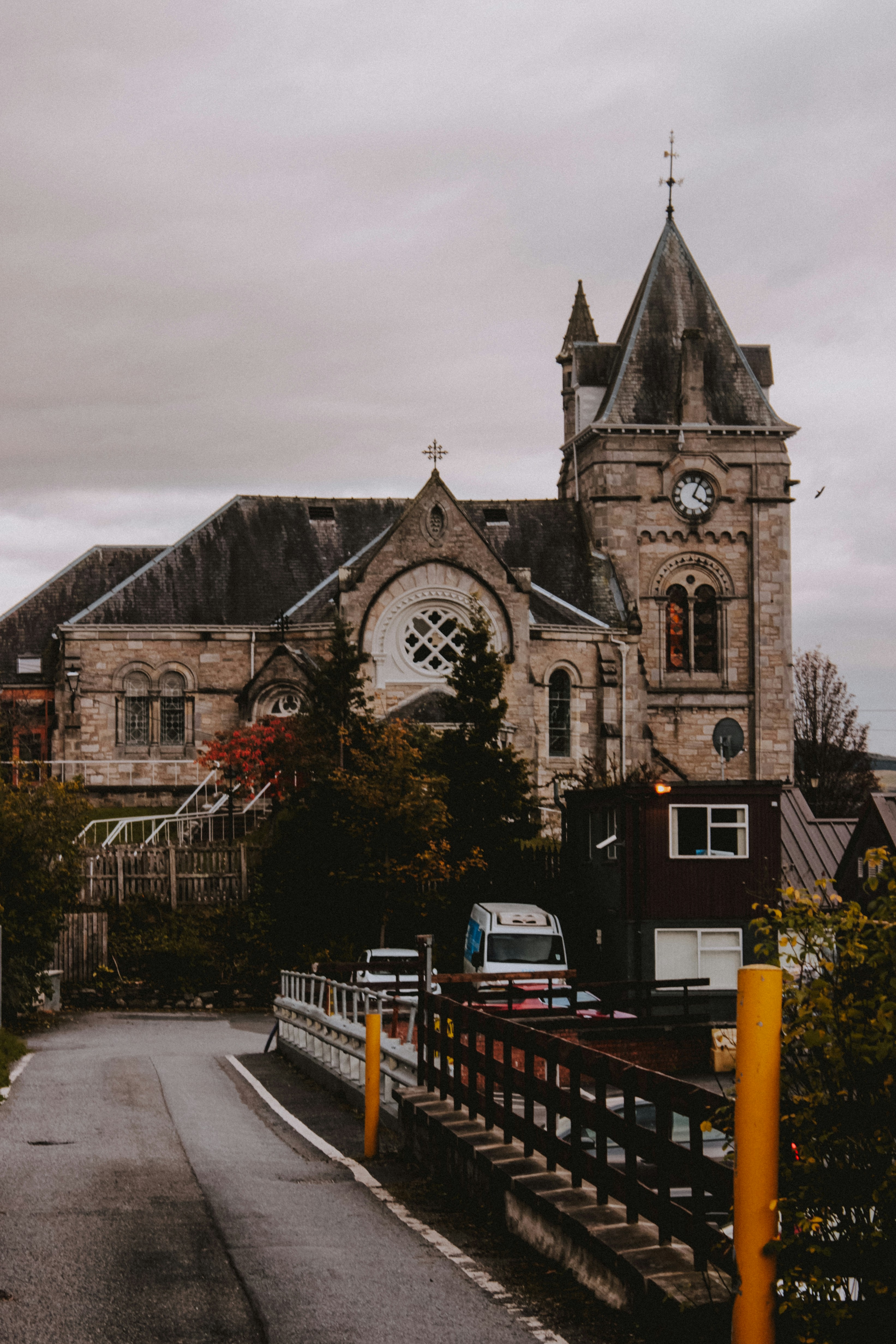 A large building with a clock on the top of it photo – Free Building ...