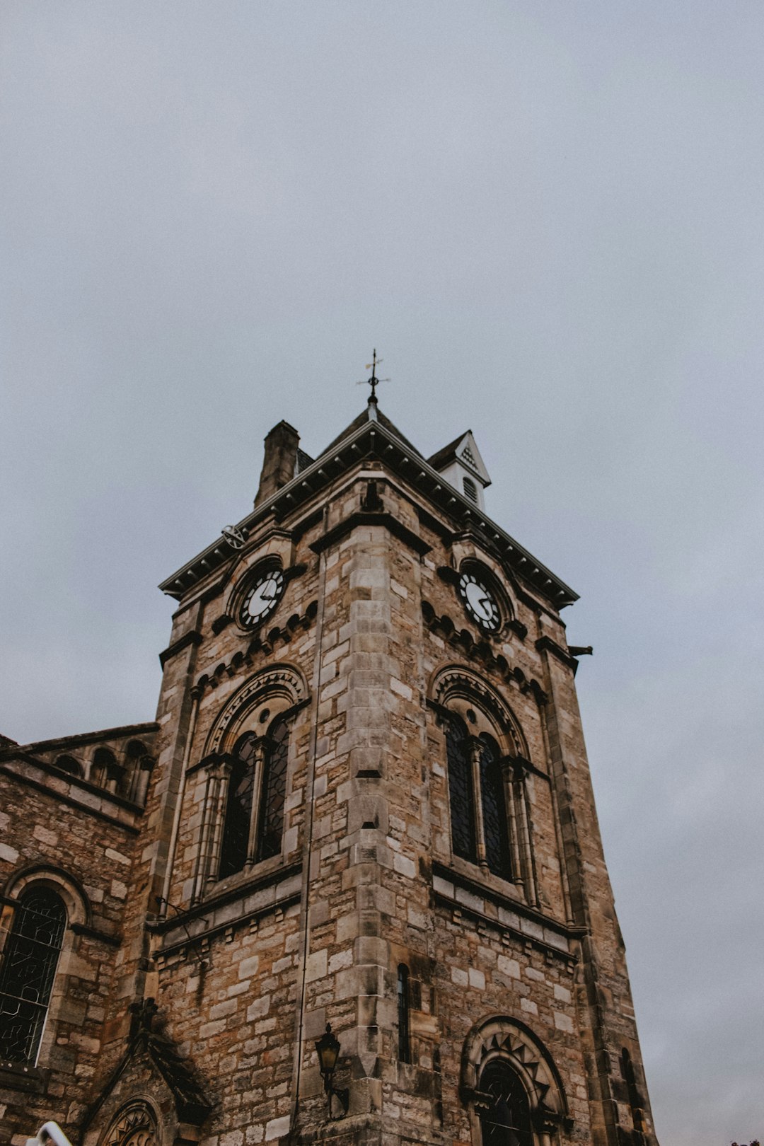 brown and gray tower clock during daytime