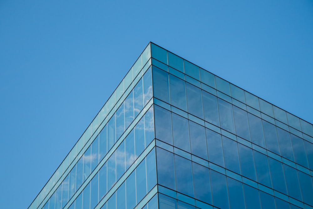 gray concrete building under clear blue sky