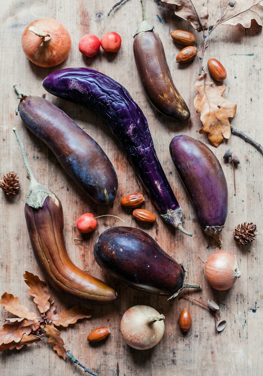 assorted brown and purple fruits