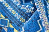 Detailed view of geometric textile design in bold colors