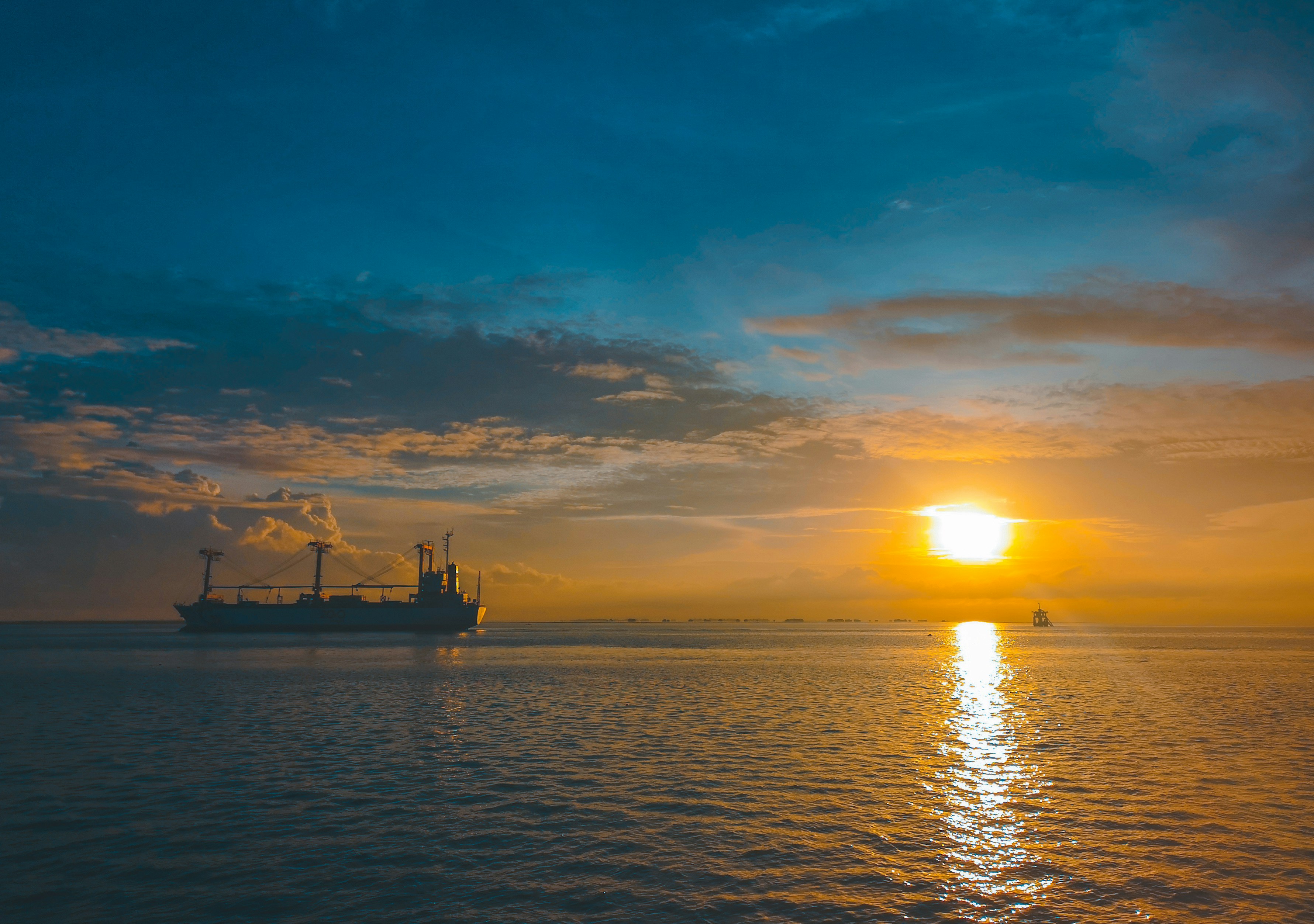 boat on body of water during golden hour