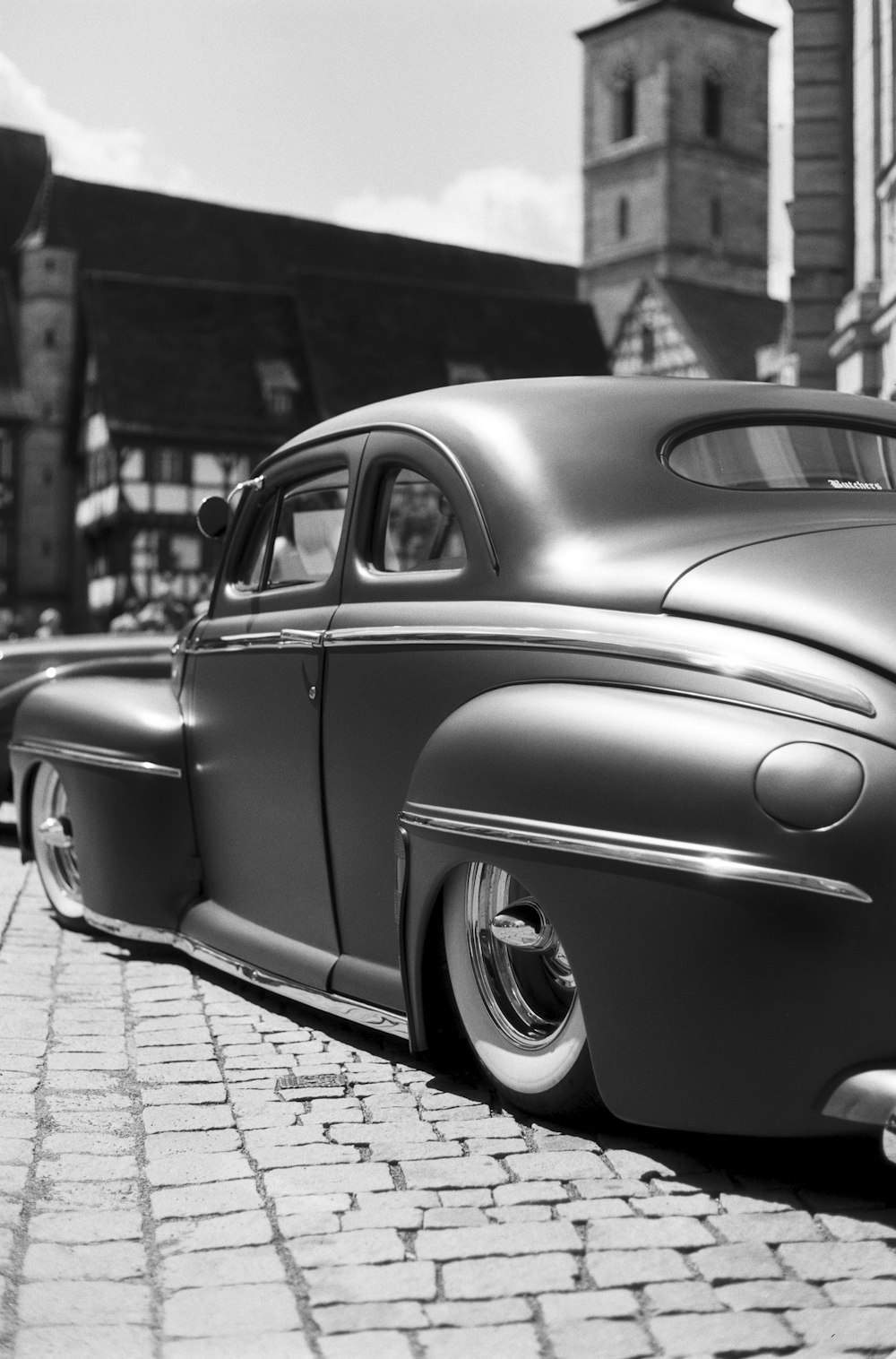 grayscale photography of vehicle