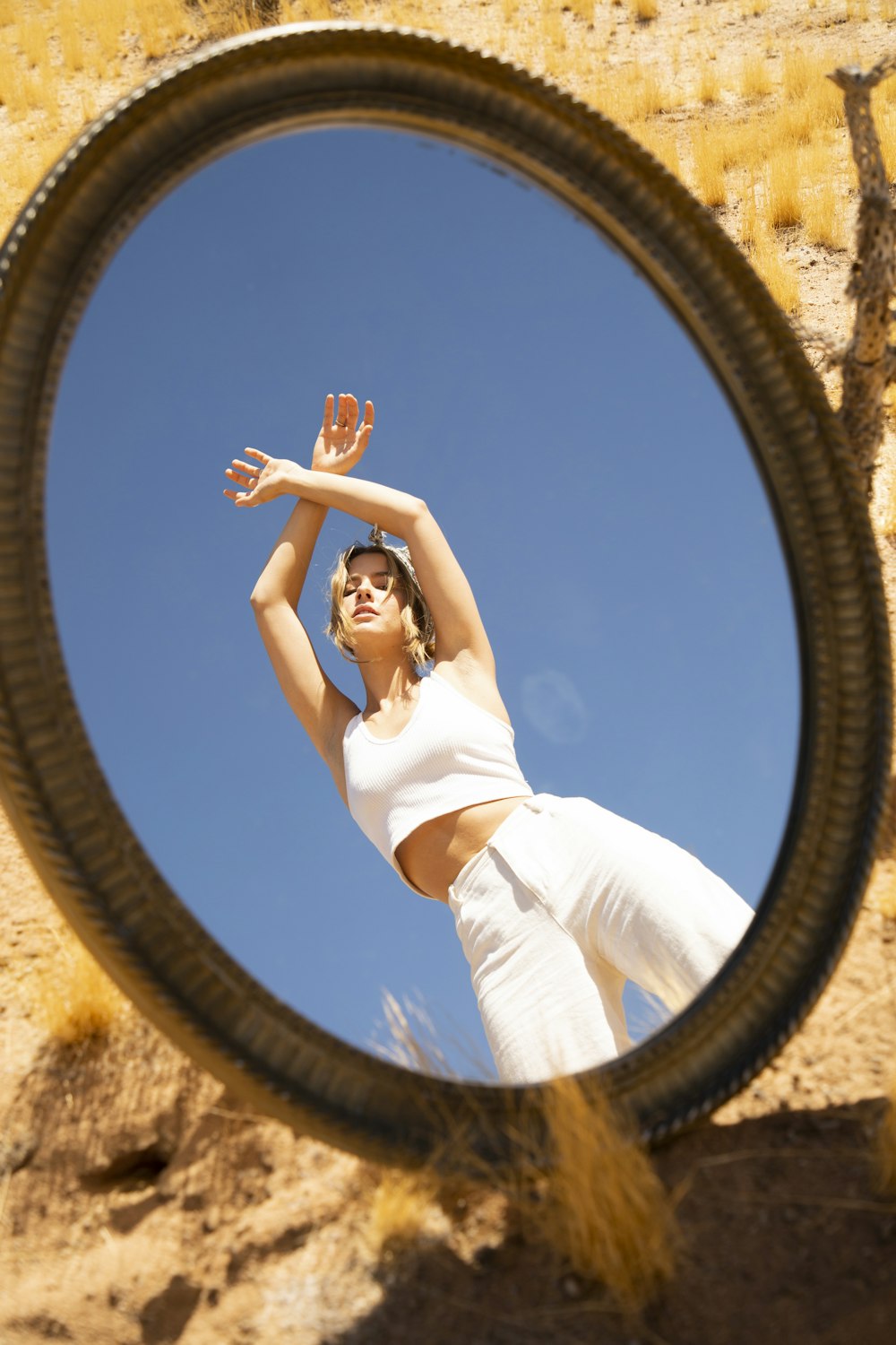 woman in front of mirror