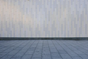 Sleek modern tiles with a matte finish laid out in a geometric pattern.