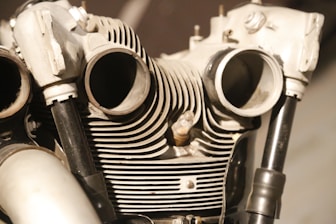 Detailed view of a polished engine cylinder head ready for installation