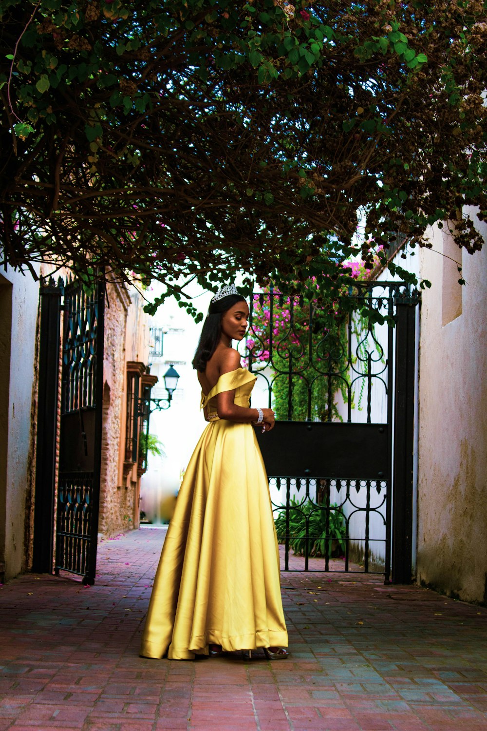 woman wearing yellow off-shoulder silt dress