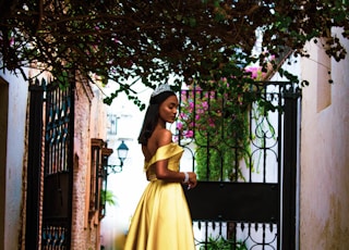 woman wearing yellow off-shoulder silt dress