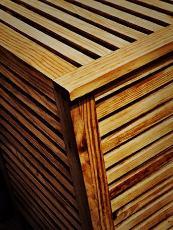 Close-up of a wooden slatted panel highlighting texture and detail.