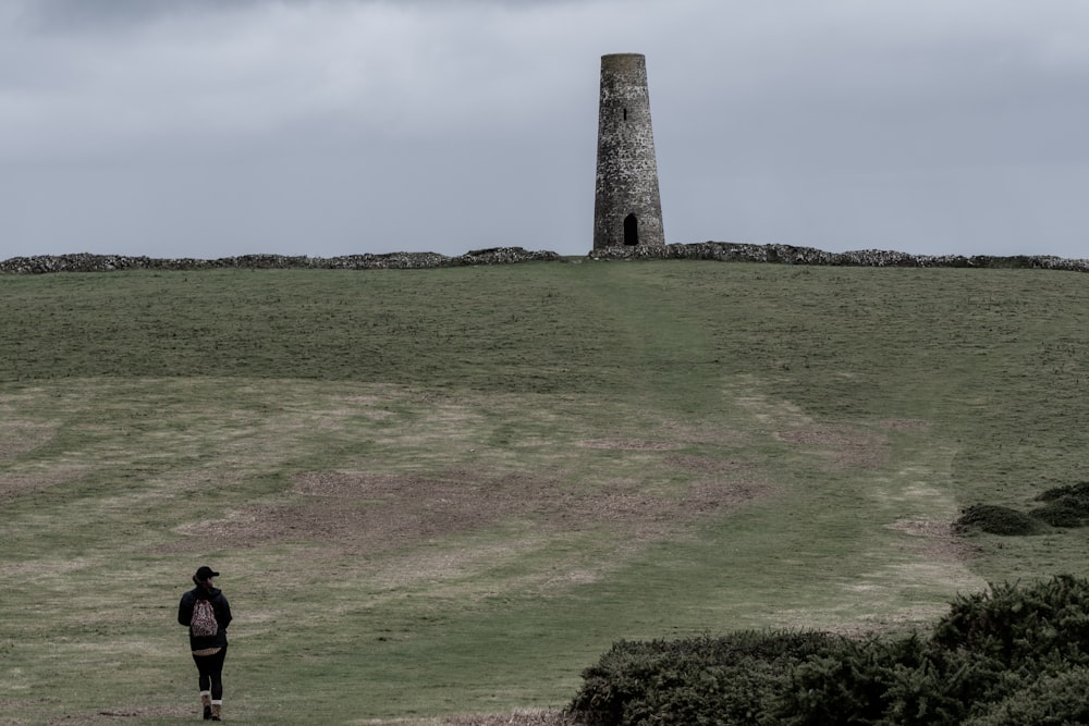 man walking on hills