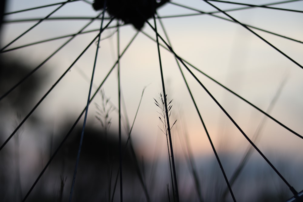 a close up of the spokes of a bicycle wheel