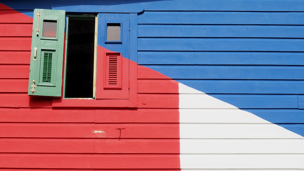 building with half opened French windows