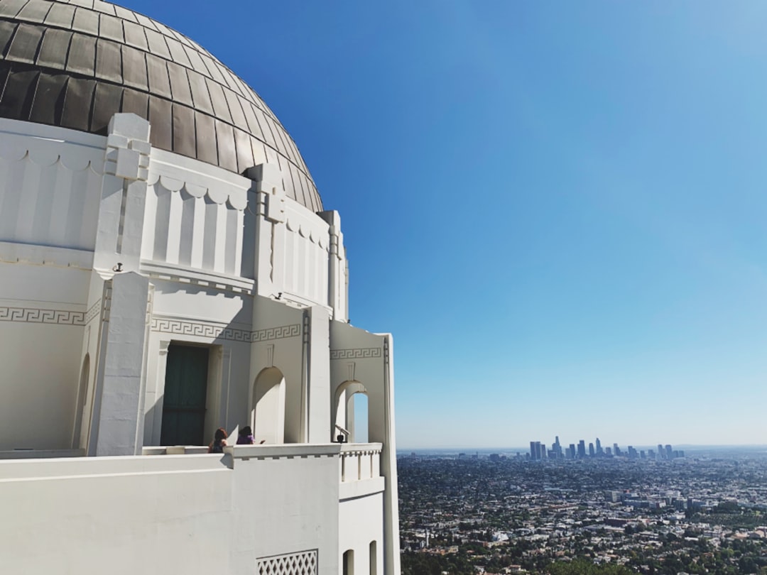 white concrete building, A view of downtown Los Angeles from Griffith Observatory.