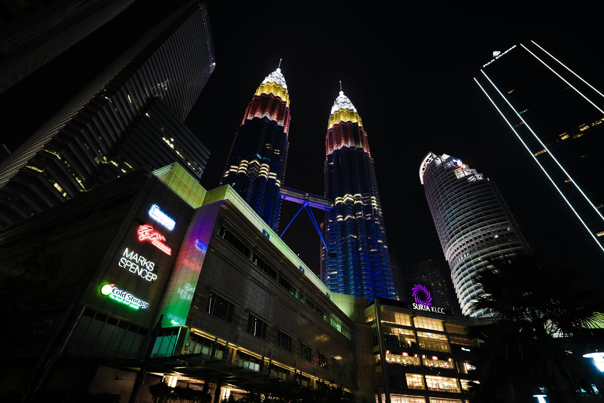 woman wearing yellow long-sleeved dress under white clouds and blue sky during daytime