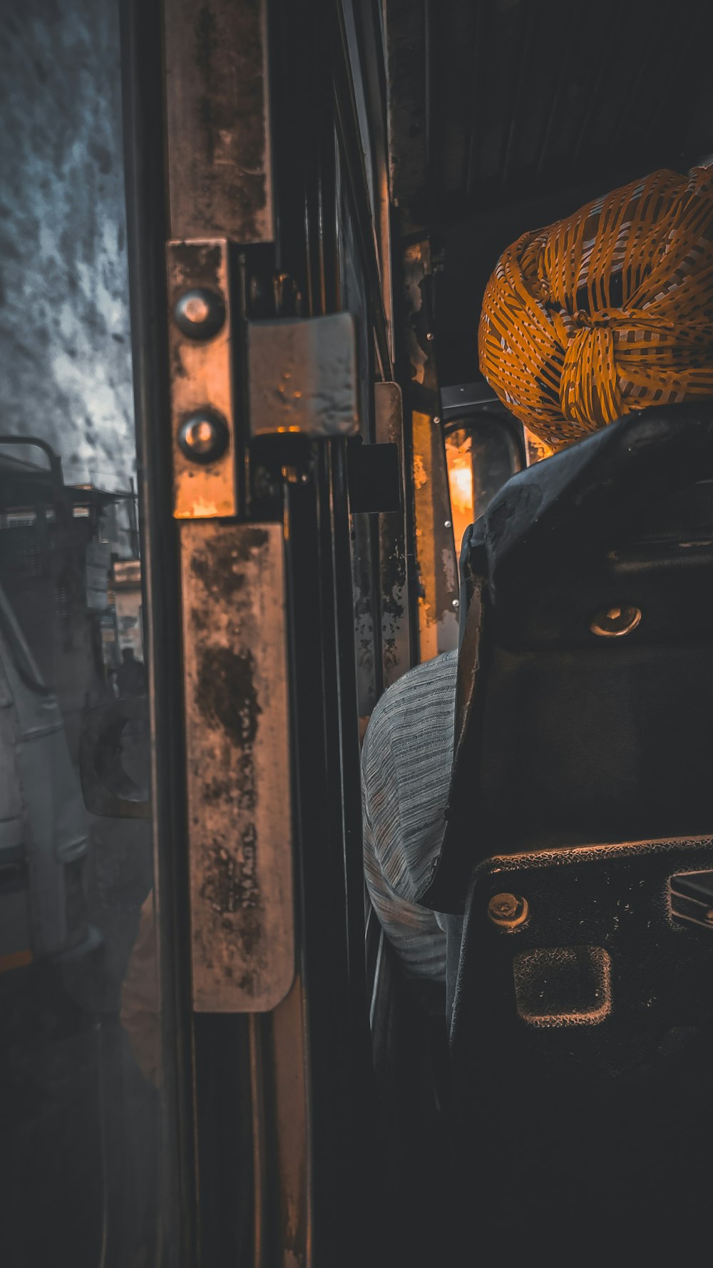 a person is sitting on a bus looking out the window