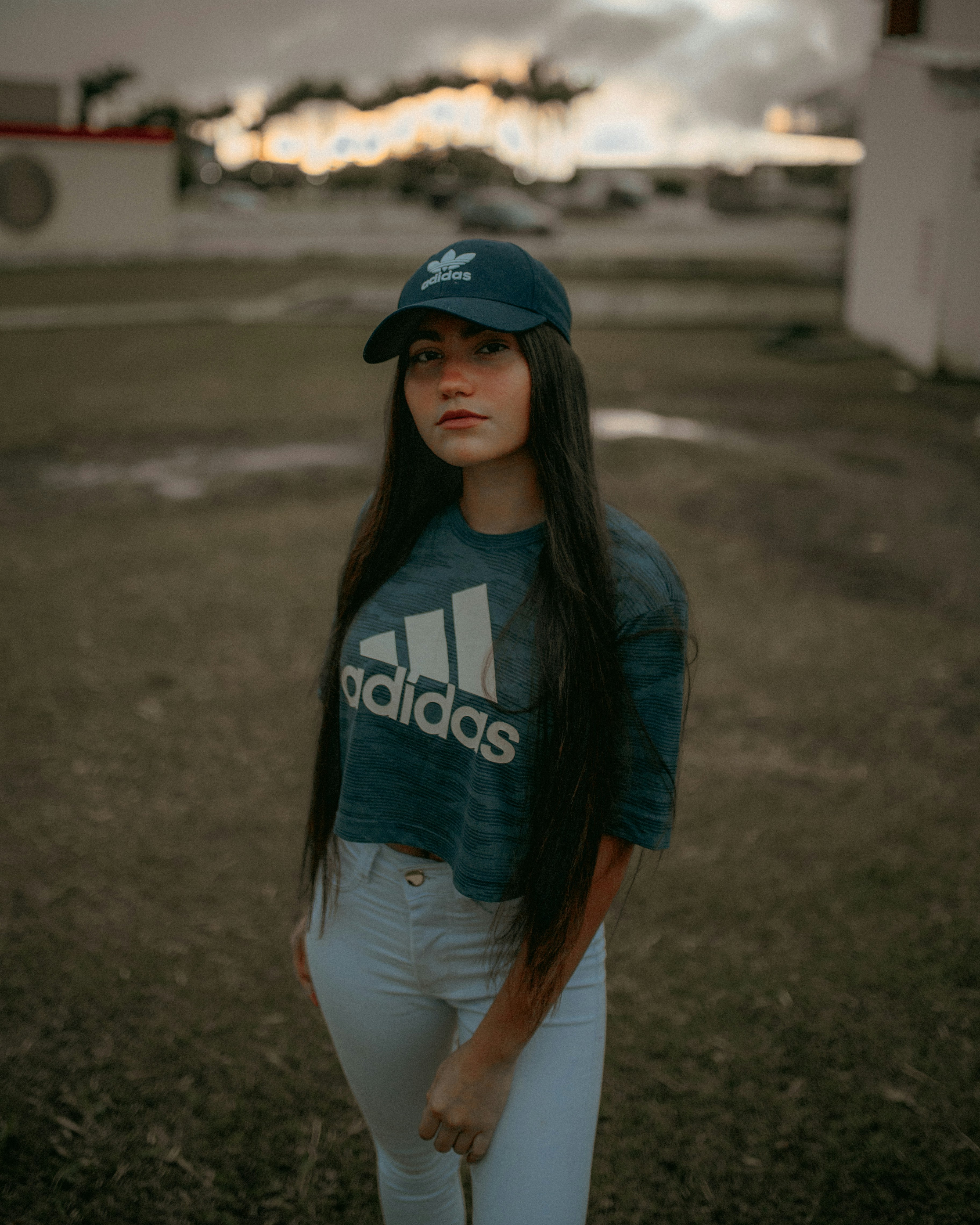 girl with adidas cap