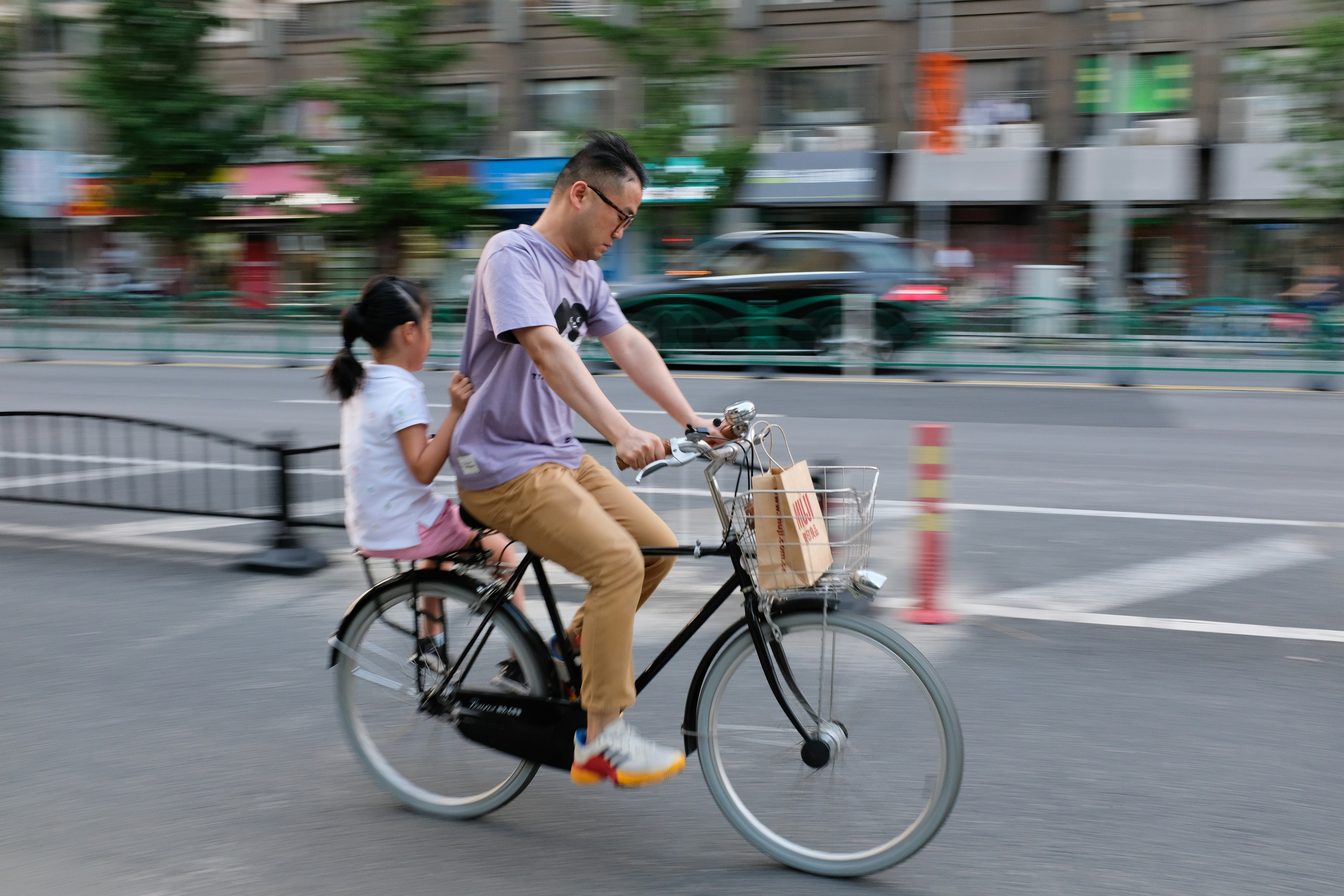 a girl riding a bicycle