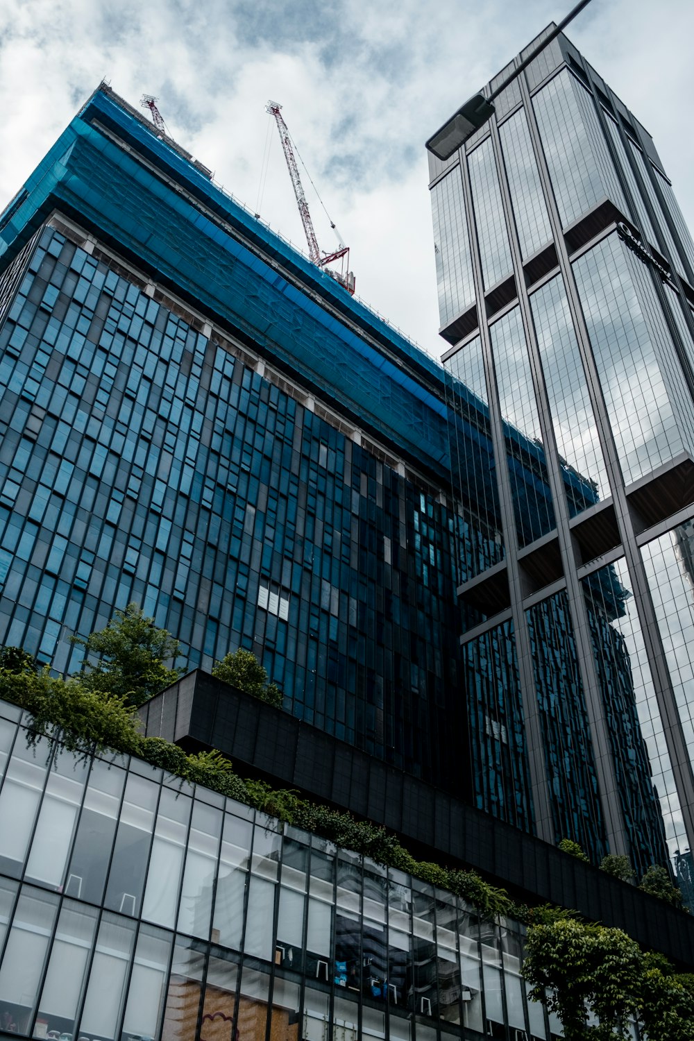 high-rise building under blue sky