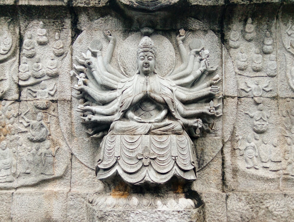 gray stone religious statue