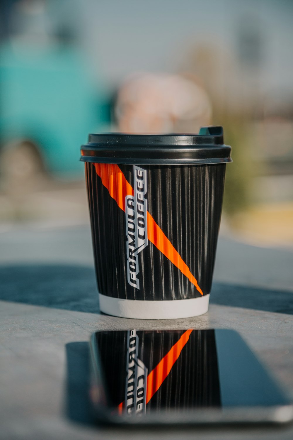 black and orange cup