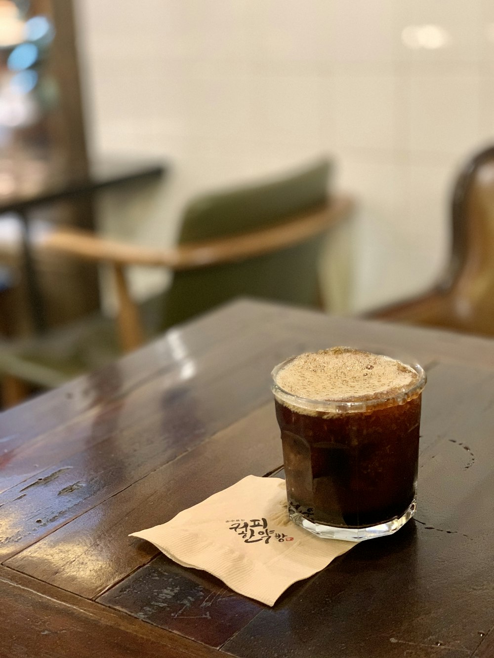 liquid in clear drinking glass on table