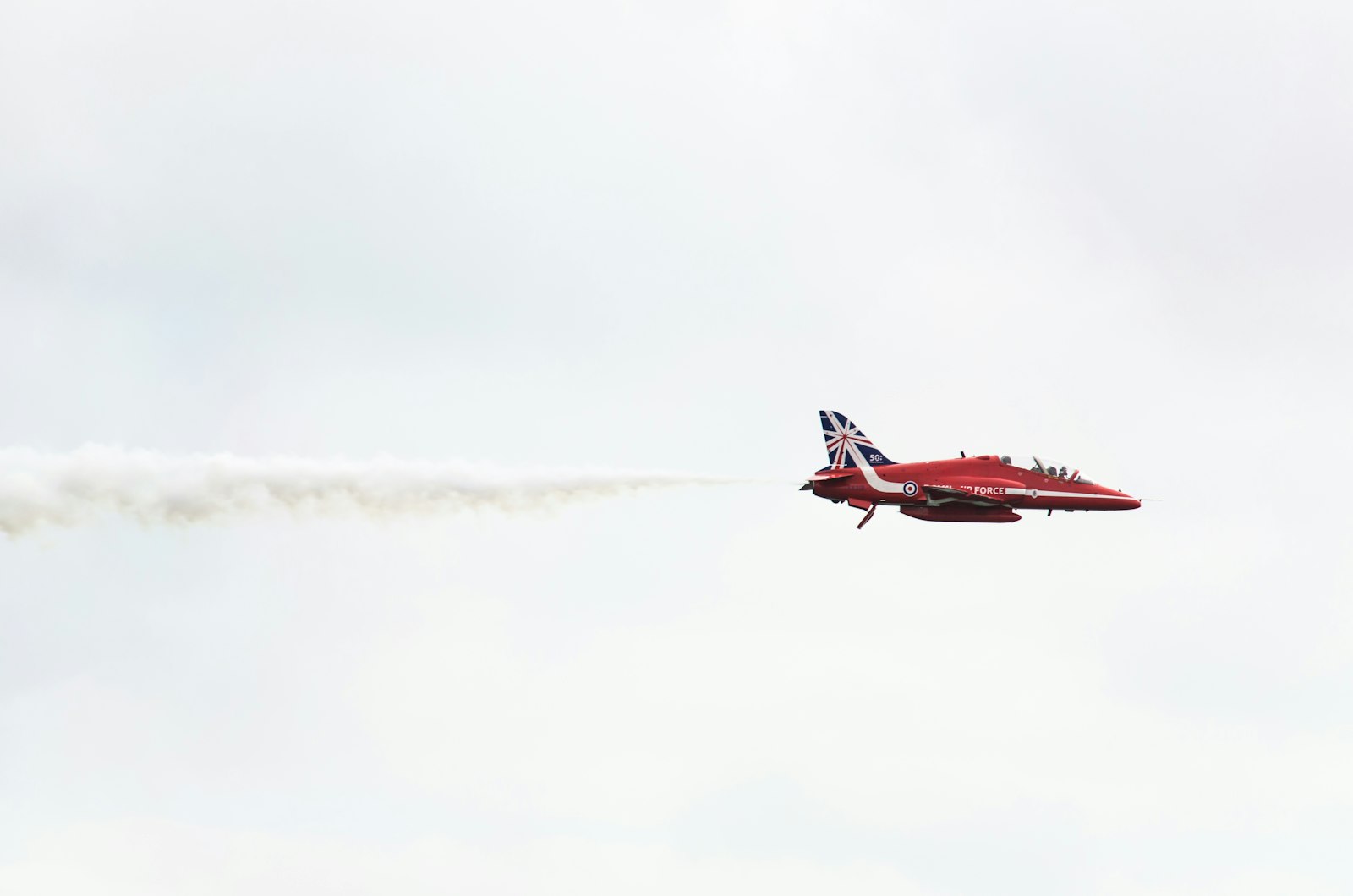 Nikon D7000 + Nikon AF-S DX Nikkor 55-300mm F4.5-5.6G ED VR sample photo. Red and white plane photography