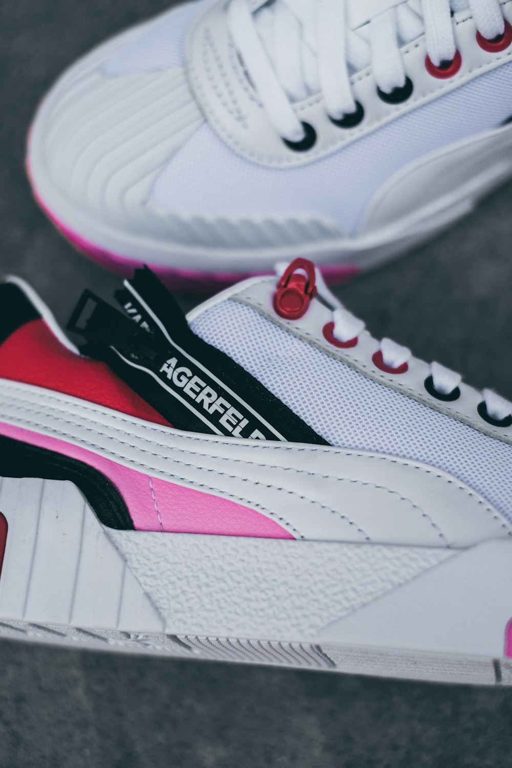 pair of white, pink, and black PUMA shoes photo – Free Apparel Image on  Unsplash