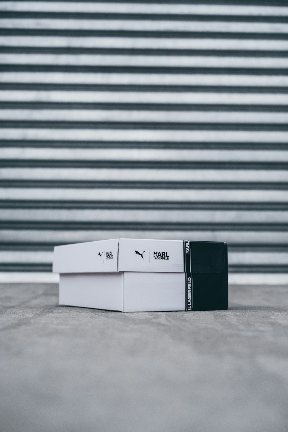 white and black Puma shoe boxes
