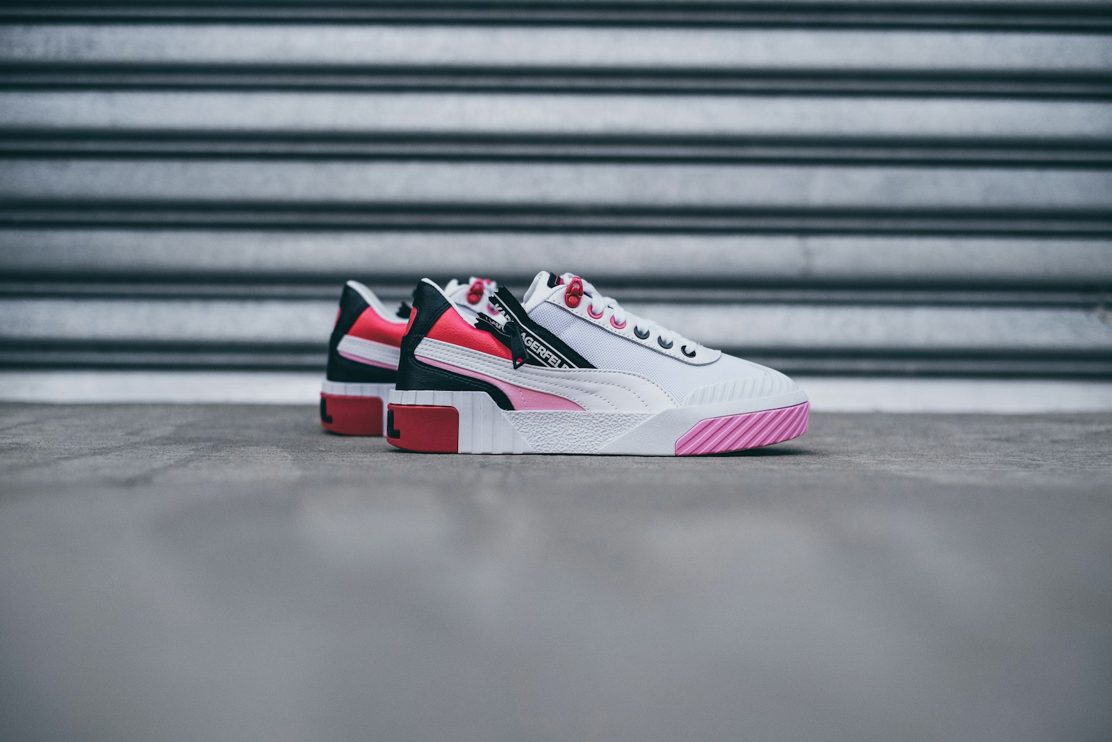Fujifilm X-T3 + Fujifilm XF 35mm F1.4 R sample photo. White-black-and-pink low-top sneakers photography