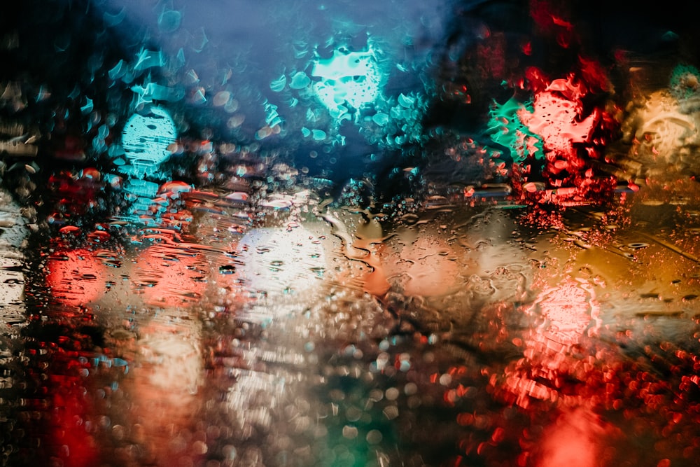 a close up of a rain covered windshield