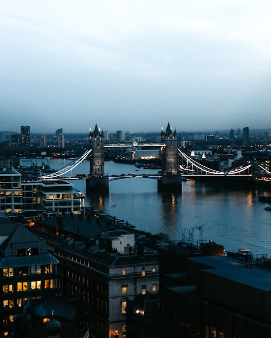 view of Tower Bridge under white skies in Tower Bridge United Kingdom