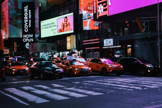 cars behind zebra cross