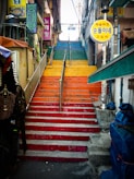 multicolored concrete stairs during daytime