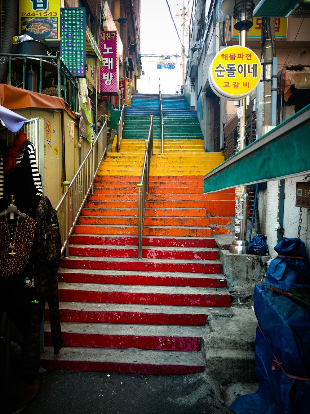 multicolored concrete stairs during daytime