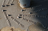 Close-up of a weathered historical marker detailing a key battle event.