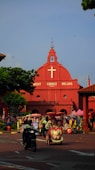 red cathedral under blue sky