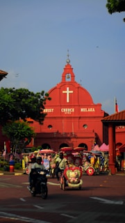 red cathedral under blue sky