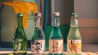 a group of bottles sitting on top of a table