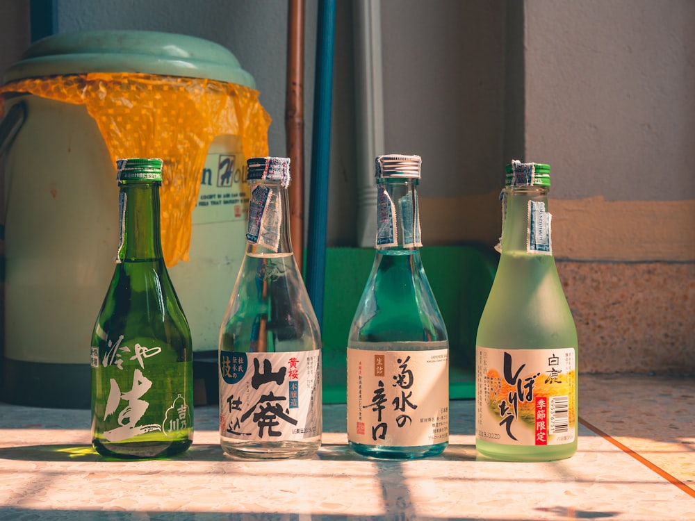 a group of bottles sitting on top of a table