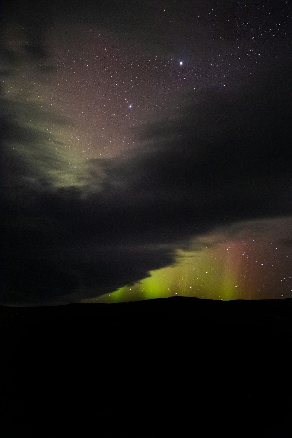 stars and clouds during night