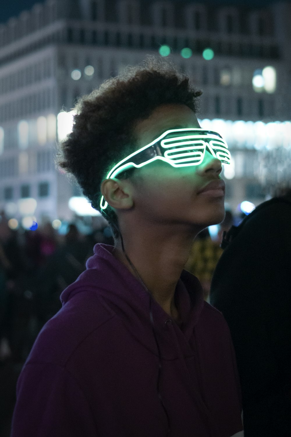 man wearing green shutter glasses