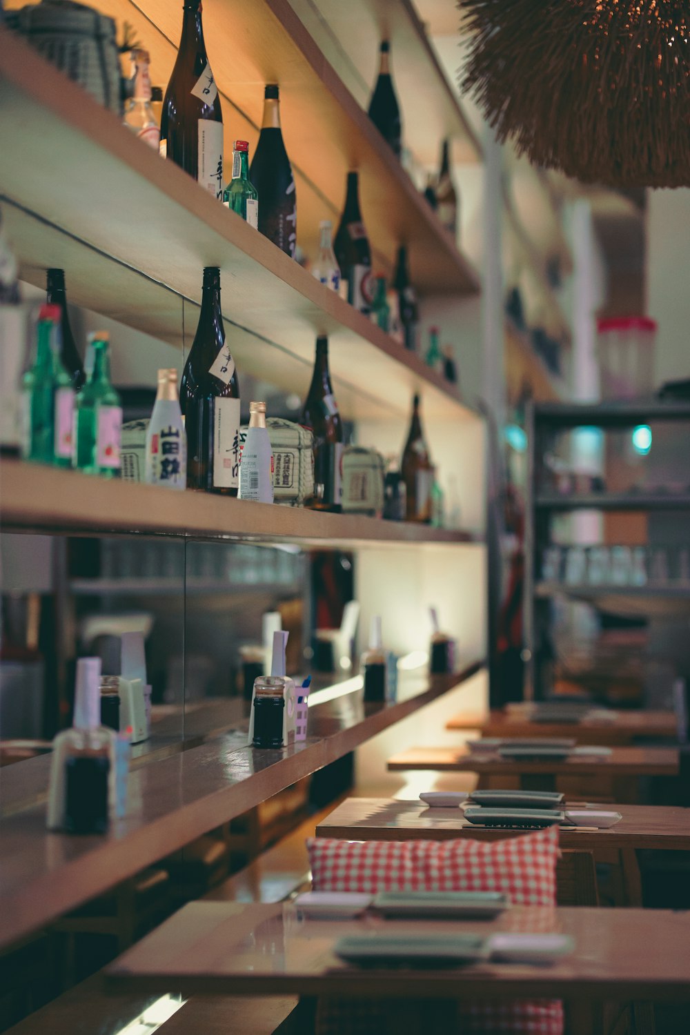 different wine bottles displayed on shelf