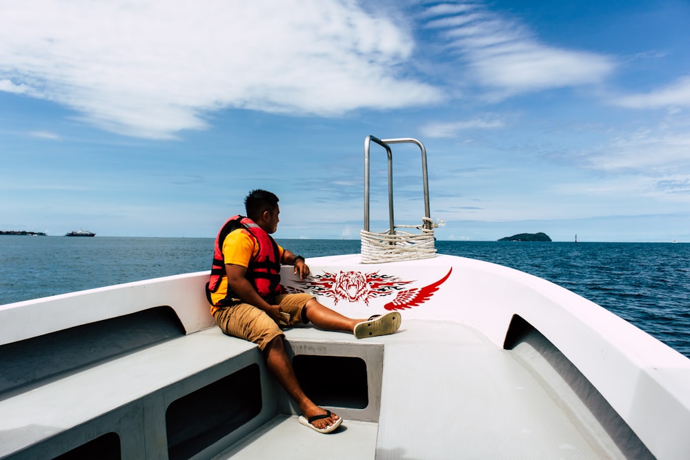 man sits on the speedboat