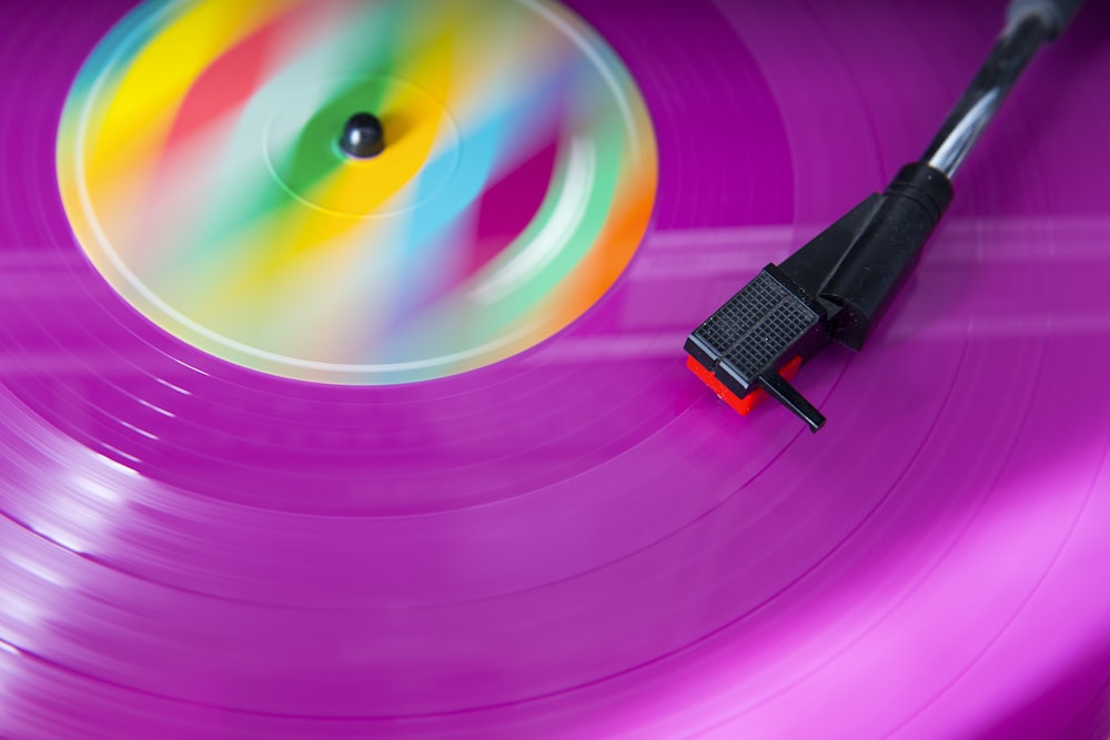 purple and pink turntable