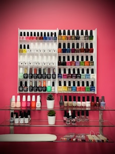 Stylish manicure station with colorful nail polishes and polished nails.