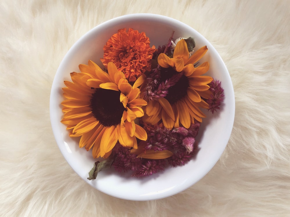 sunflower on white bowl