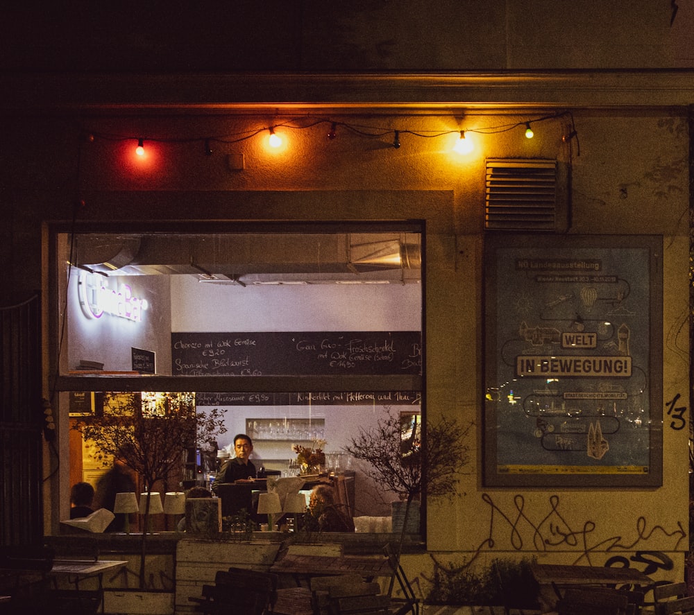 people inside restaurant during night time