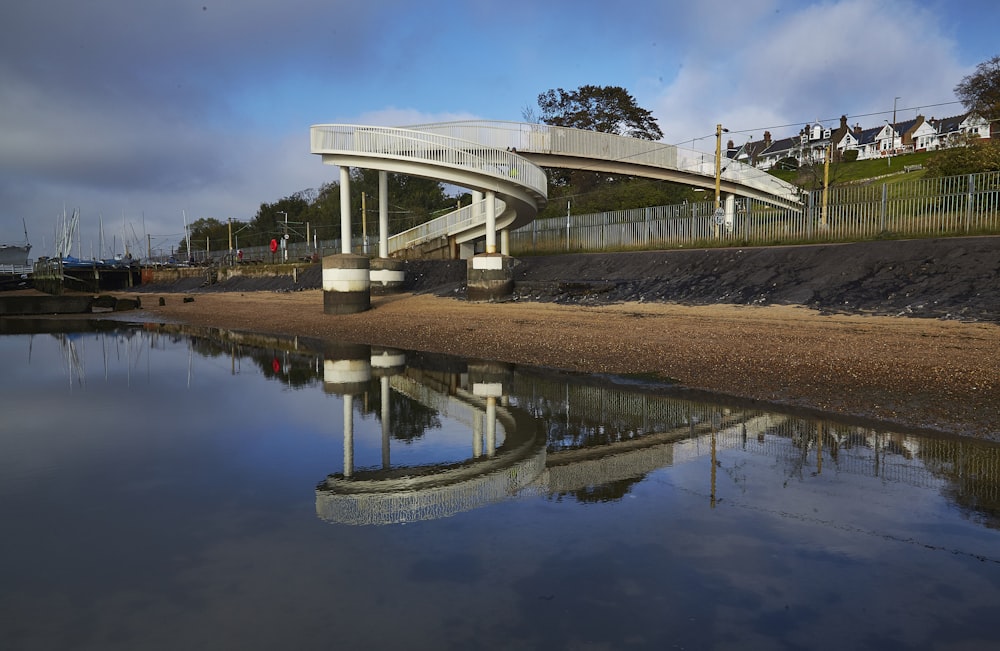 shallow river with bridge