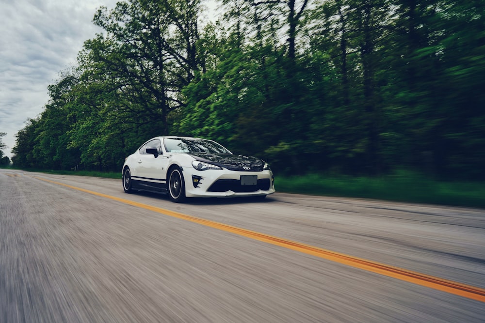 white and black sports coupe